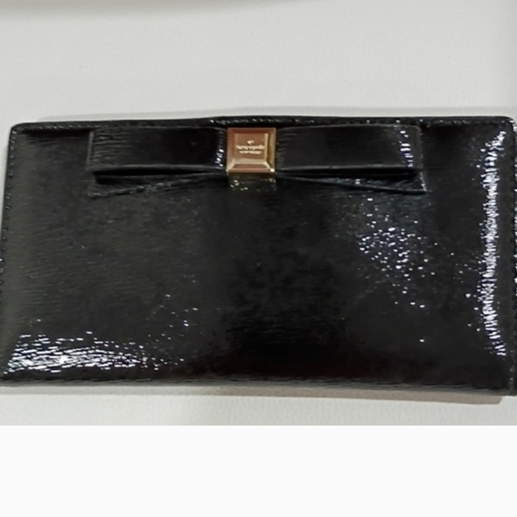 kate spade Handbags - Kate Spade Black Glossy Wallet with Bow